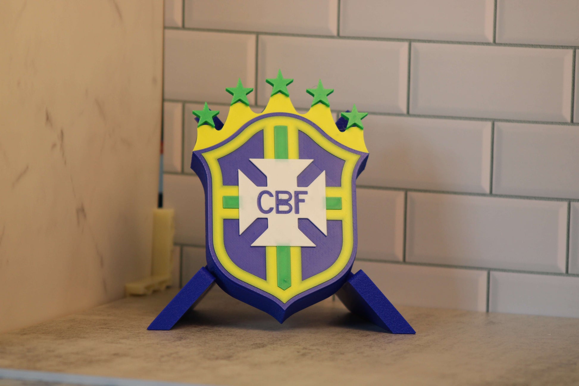 3D printed Brazil National Team emblem with vibrant colors, honoring 5 World Cup wins for soccer fans.