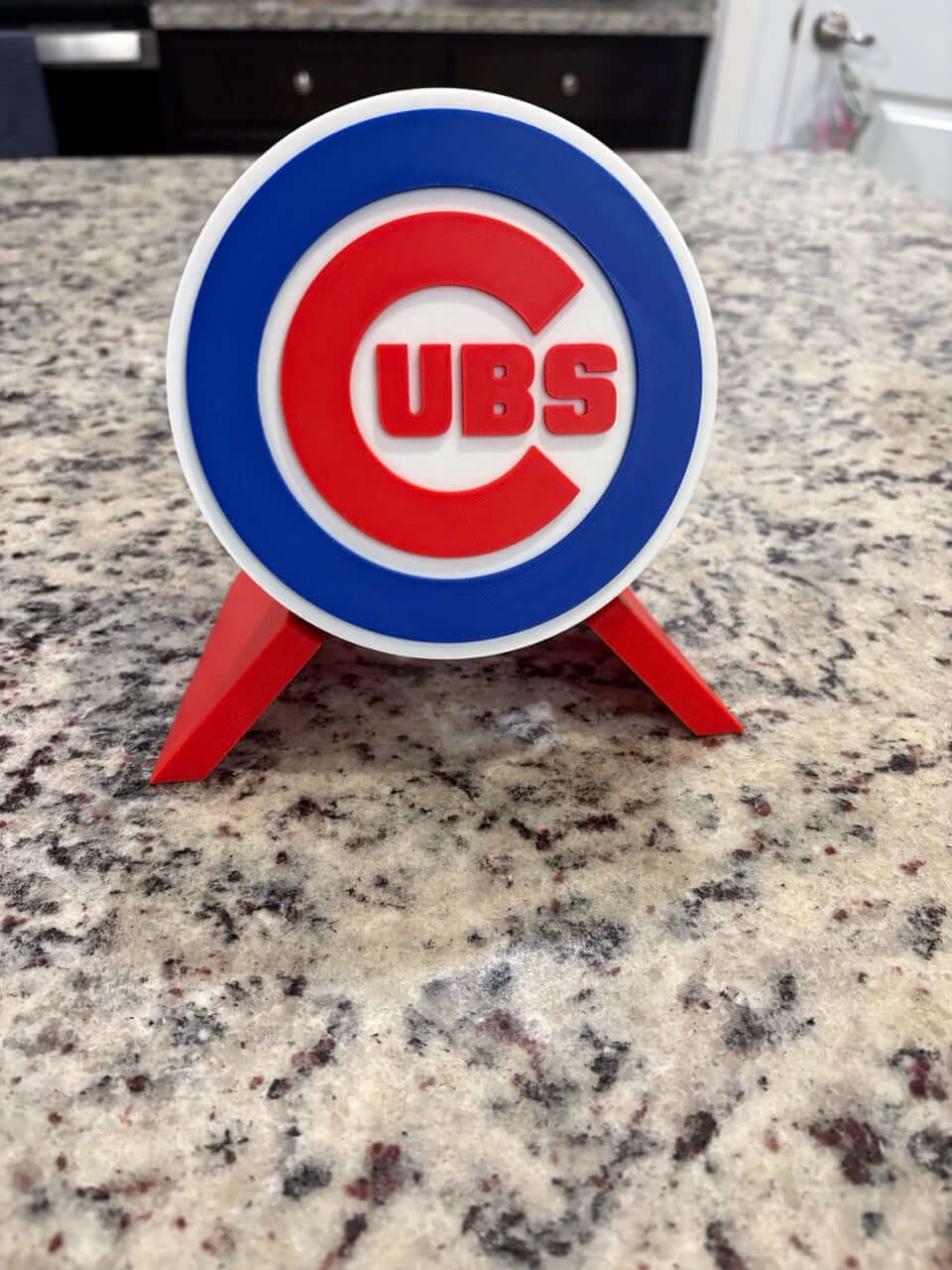 3D Chicago Cubs plaque on a kitchen countertop, showcasing vibrant colors and unique design for baseball fans.