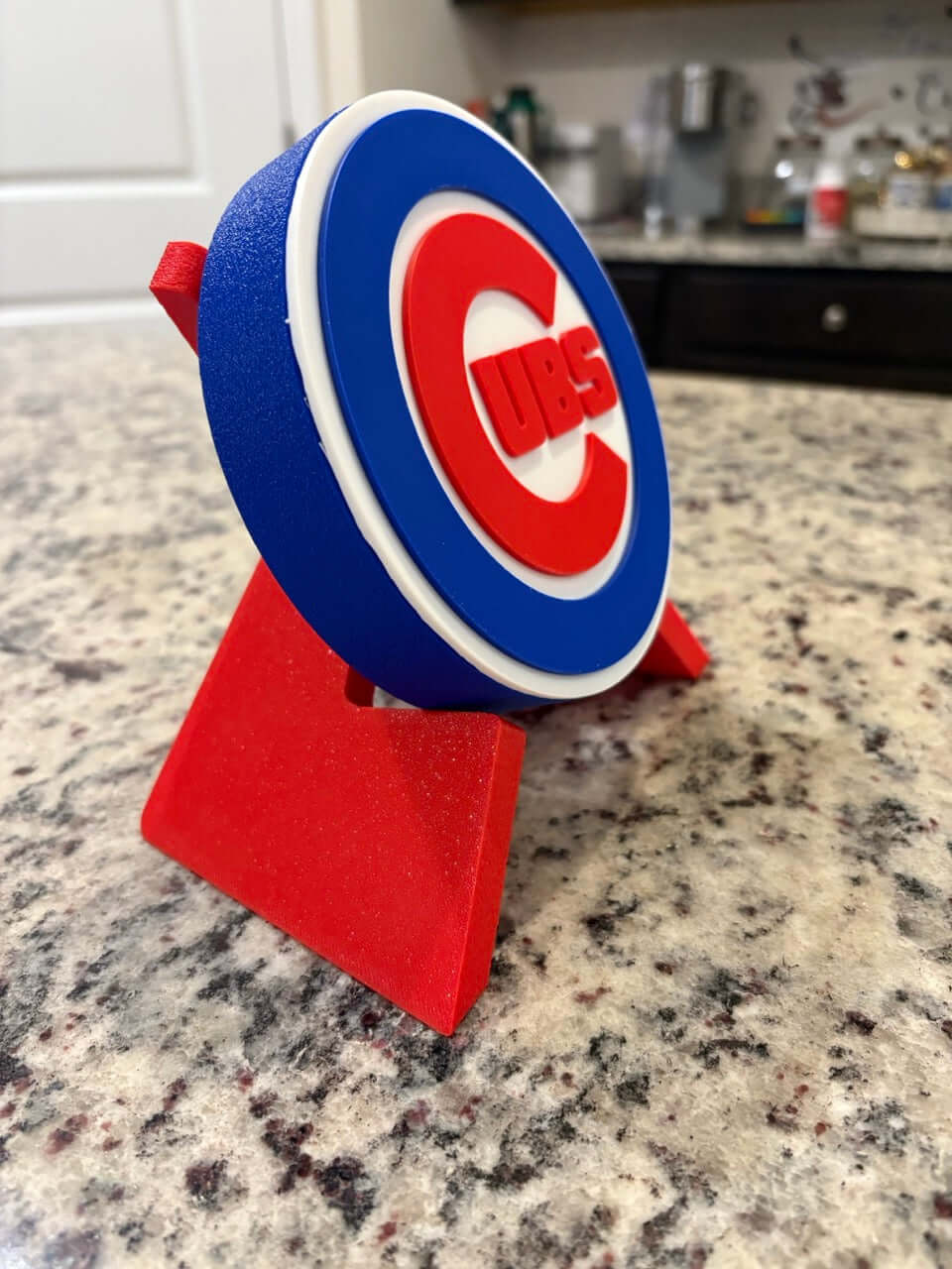 3D Chicago Cubs plaque on a countertop, showcasing vibrant colors and unique design for baseball fans.