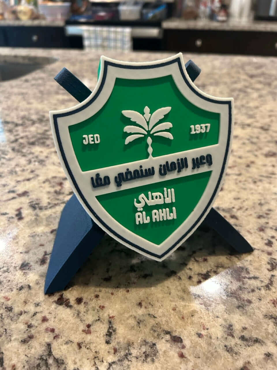 Al-Ahli Saudi FC 3D printed plaque on display, showcasing vibrant colors and detailed crest design.