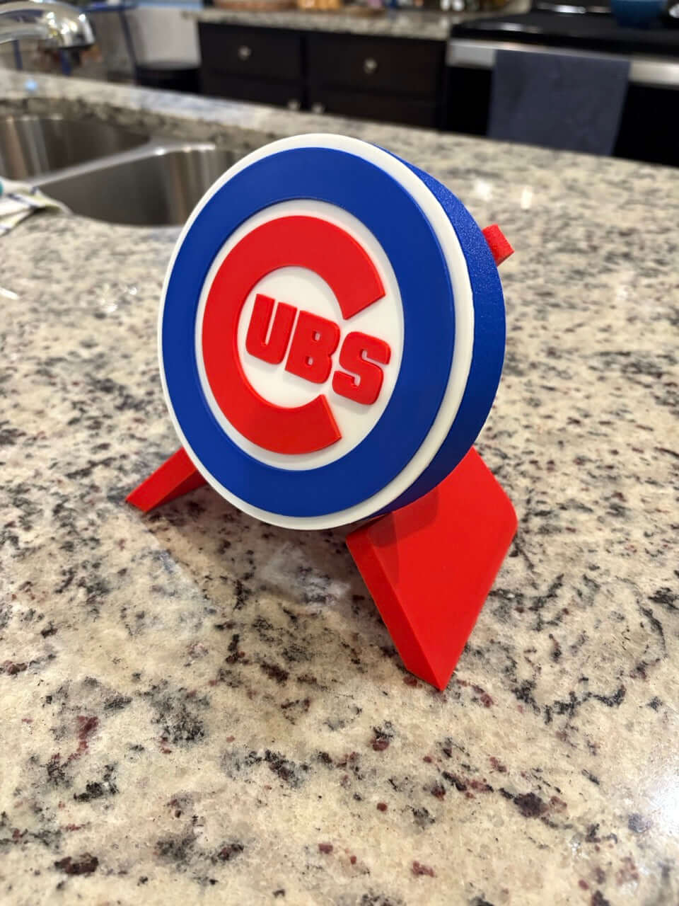 3D Chicago Cubs plaque on a countertop, featuring vibrant colors and unique design, perfect for baseball fans.
