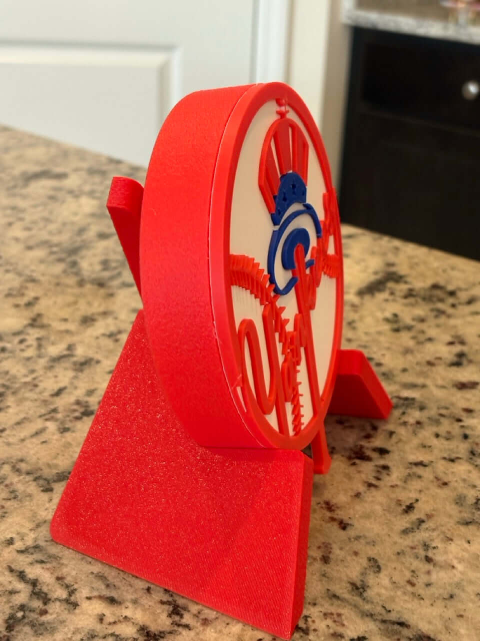 Vibrant red 3D printed New York Yankees plaque showcasing unique design for sports decor.