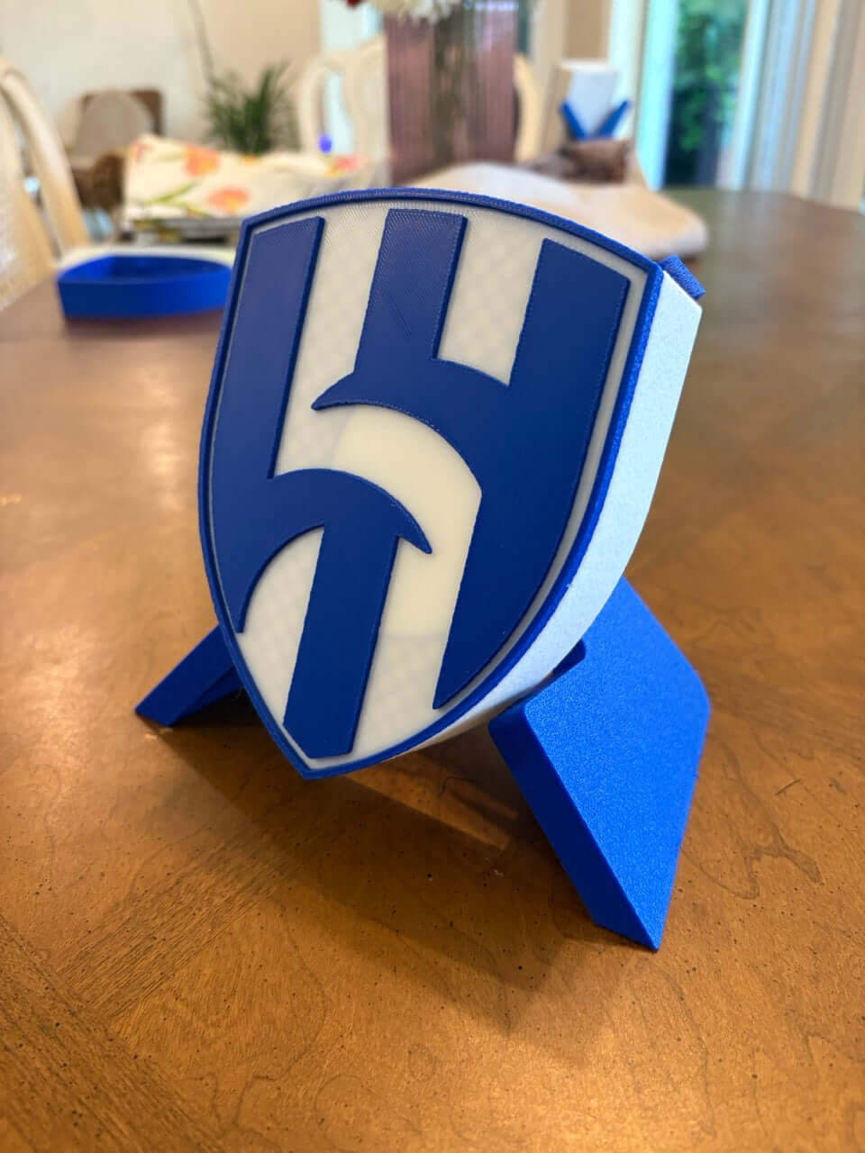 3D printed Al Hilal FC plaque showcasing vibrant blue shield design for soccer fans, no assembly required.