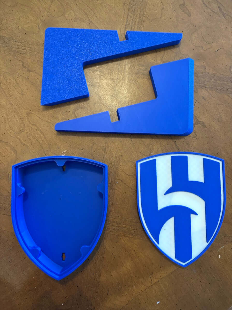 Al Hilal FC 3D printed plaque components in blue, showcasing unique pieces for customizable soccer fan decor.