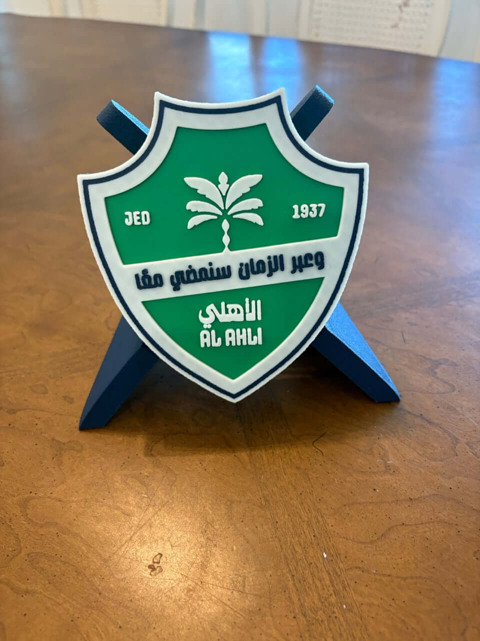 Al-Ahli Saudi FC 3D printed plaque on display, vibrant colors and high-quality materials for dedicated fans.