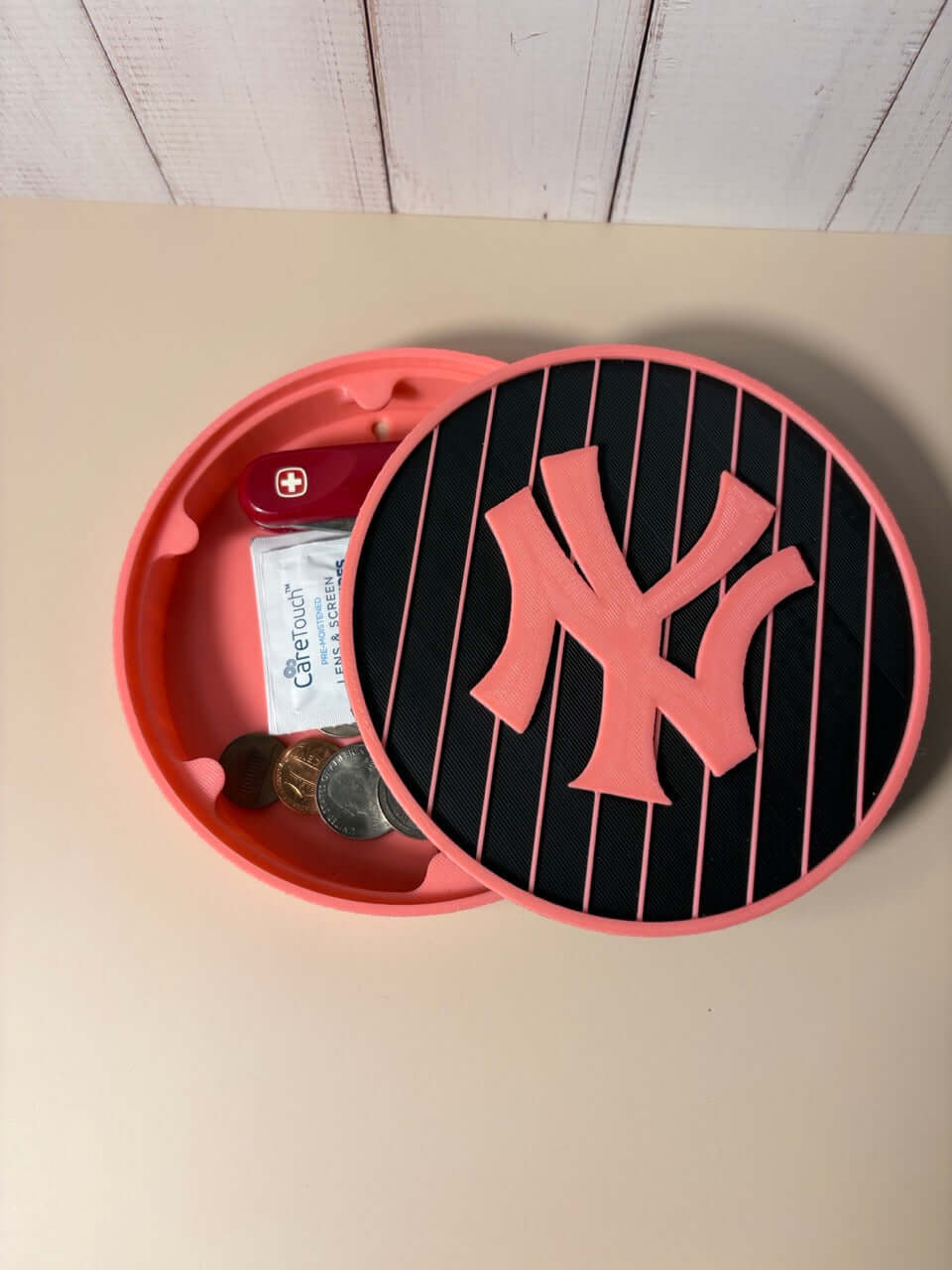 NY Yankees 3D Logo Stash Box in pink, showcasing unique multicolor printed design, perfect for storing change and small items.