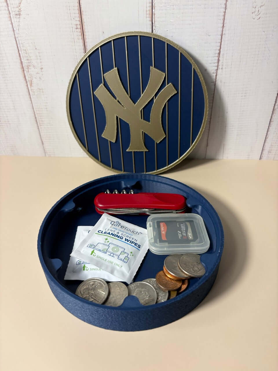 NY Yankees 3D Logo Stash Box showcasing vibrant colors and unique design, perfect for storing coins and small items.