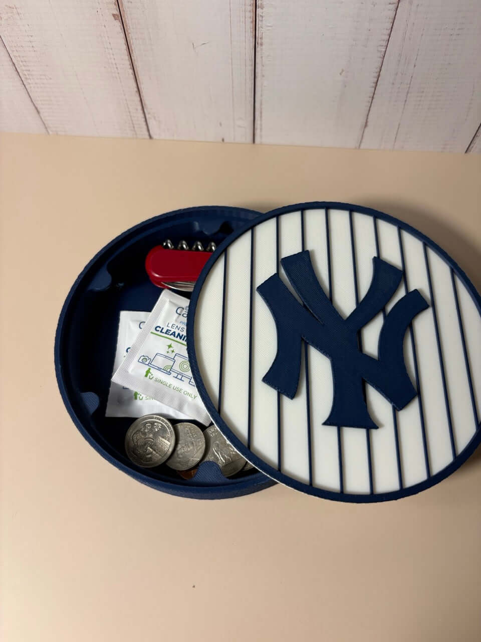 NY Yankees 3D Logo Stash Box opened, showcasing unique multicolor printing and high-quality materials for baseball fans.