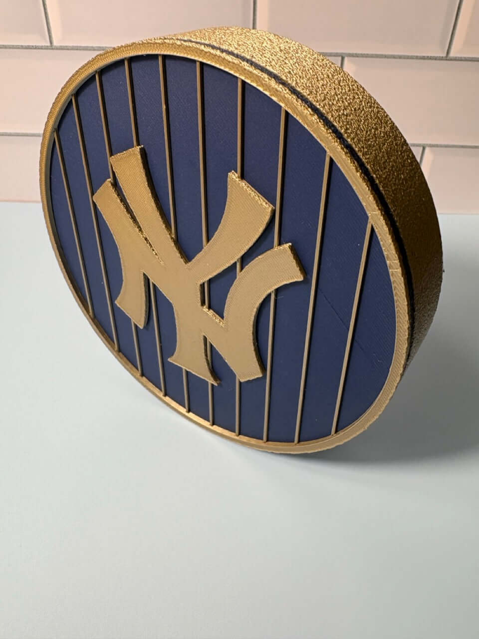 NY Yankees 3D Logo Stash Box in blue and iridium gold, featuring high-quality materials and vibrant colors.