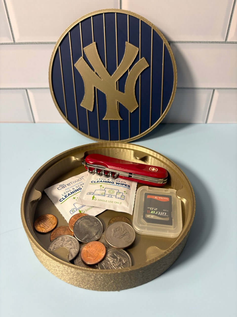 NY Yankees 3D logo stash box showcasing vibrant colors and unique design, perfect for storing coins and small items.
