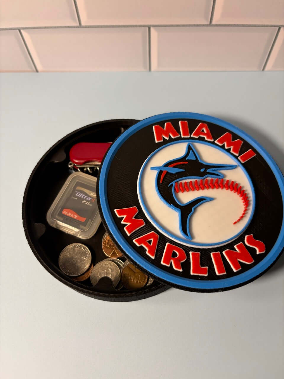 Florida Marlins 3D logo stash box open, showcasing vibrant colors and unique design, perfect for fans. No assembly required.