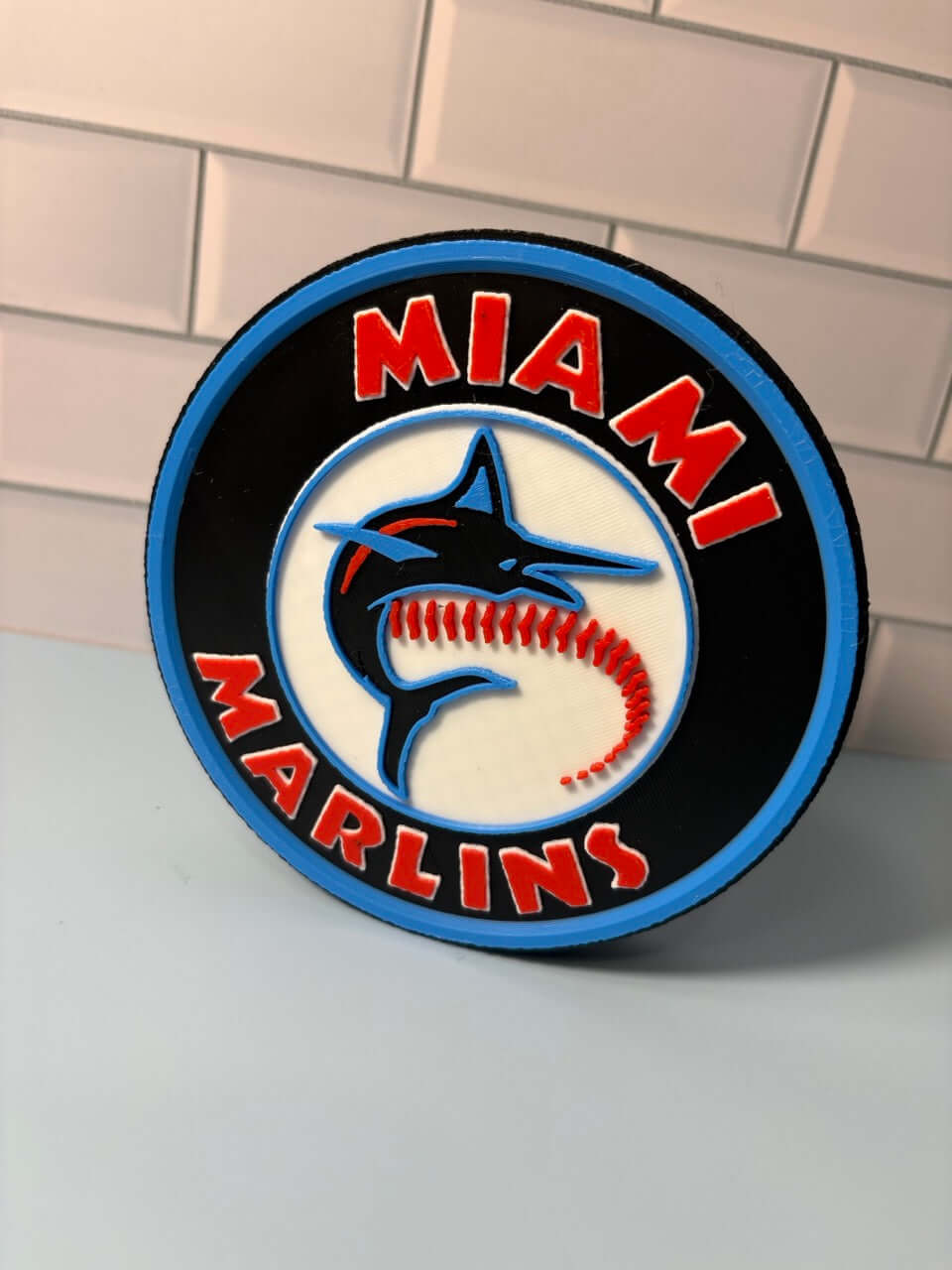 3D printed Miami Marlins logo stash box featuring vibrant colors, no assembly needed, customizable fan gift.