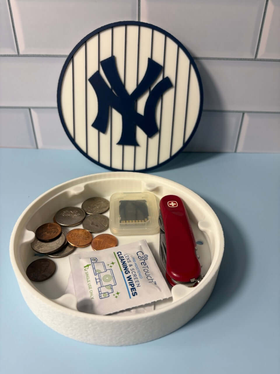 NY Yankees 3D Logo Stash Box filled with coins and tools, showcasing vibrant colors and high-quality materials.