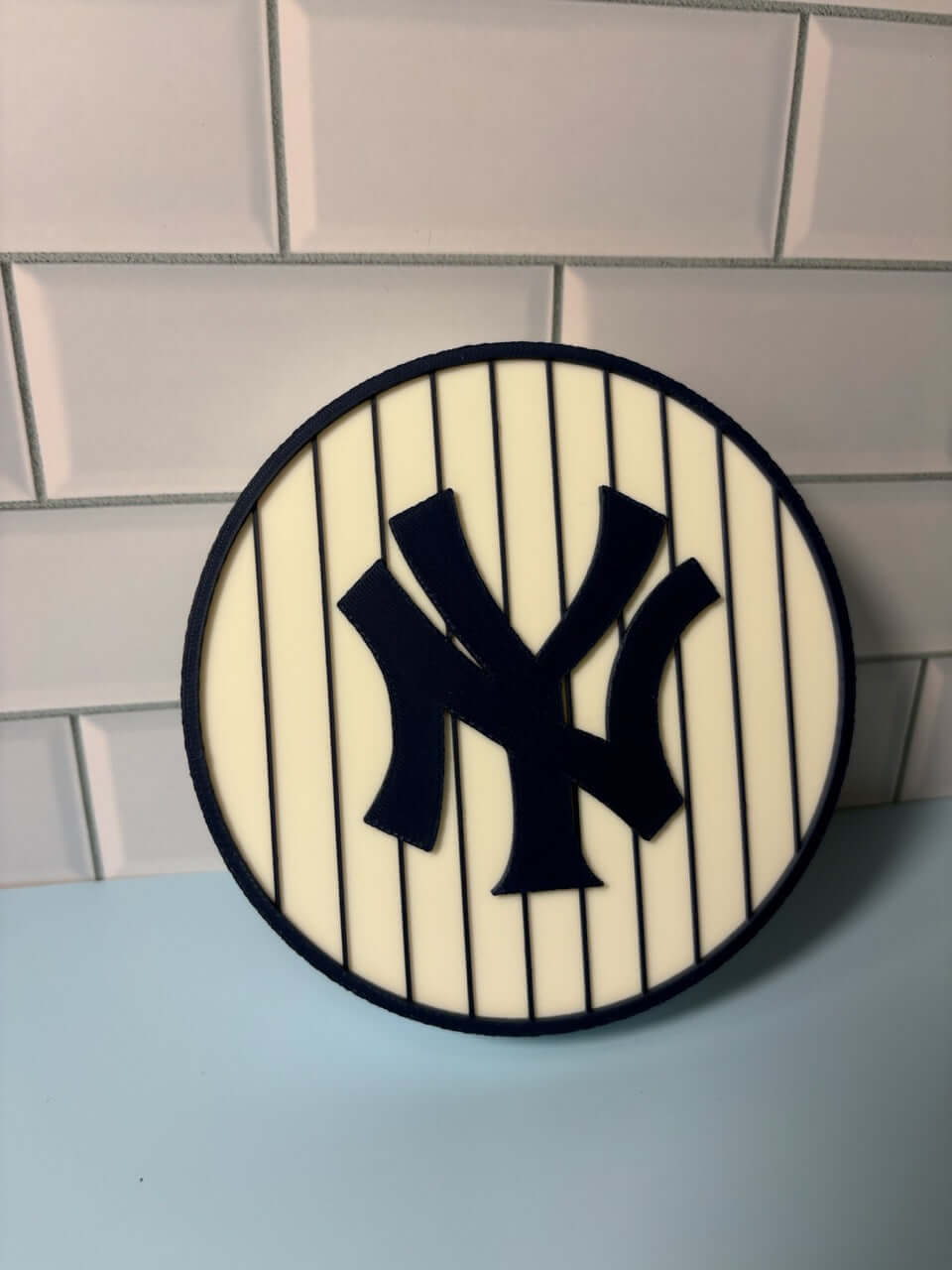 NY Yankees 3D logo on a stylish stash box, vibrant colors and high quality materials for unique baseball gift.