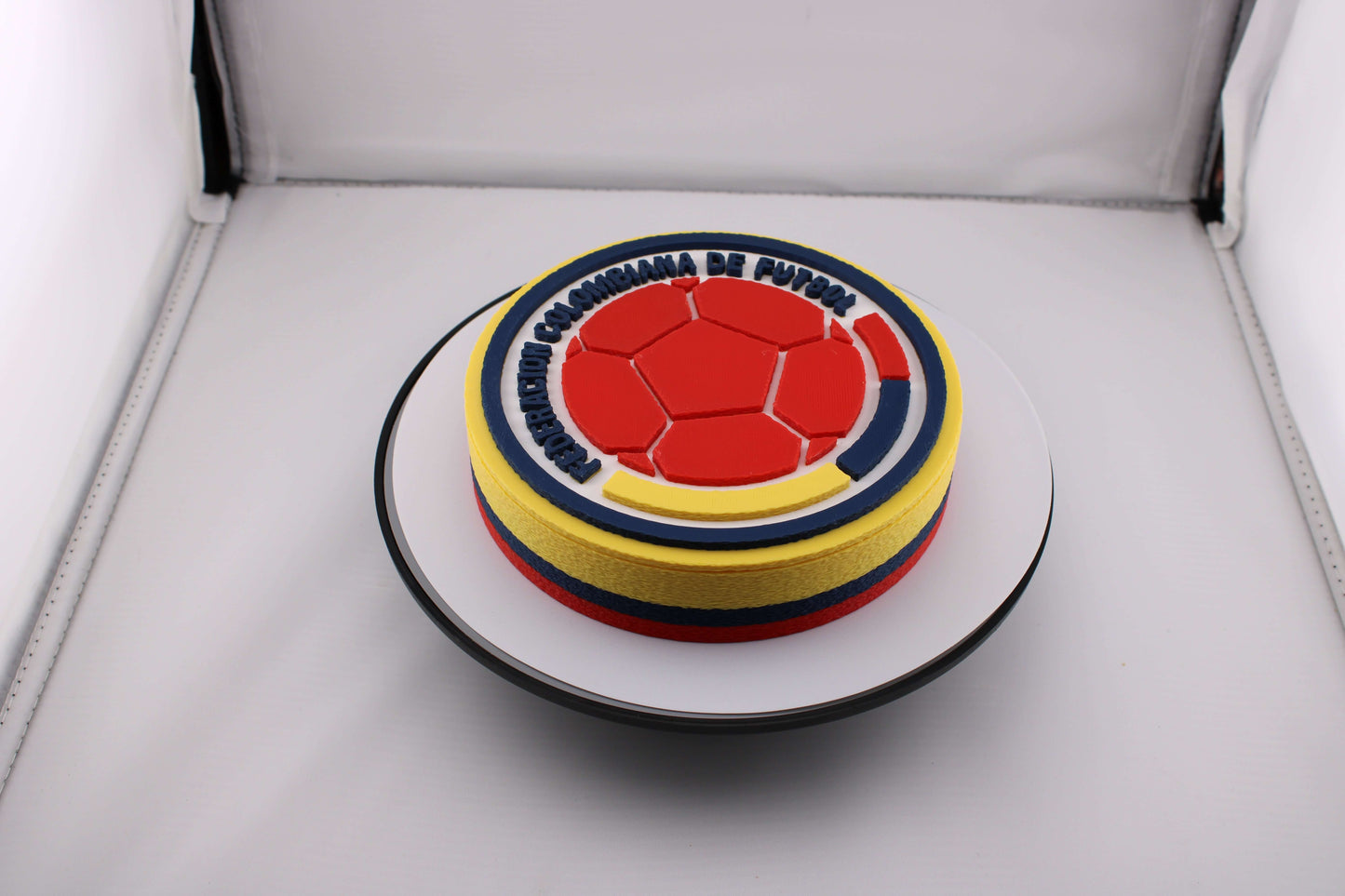 3D printed Colombian soccer emblem plaque with vibrant colors and detailed craftsmanship, perfect for fans.