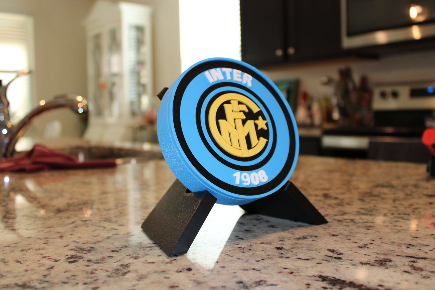 Inter Milan Retro 3D Printed Emblem displayed on a black stand, showcasing vibrant colors and high-quality materials.