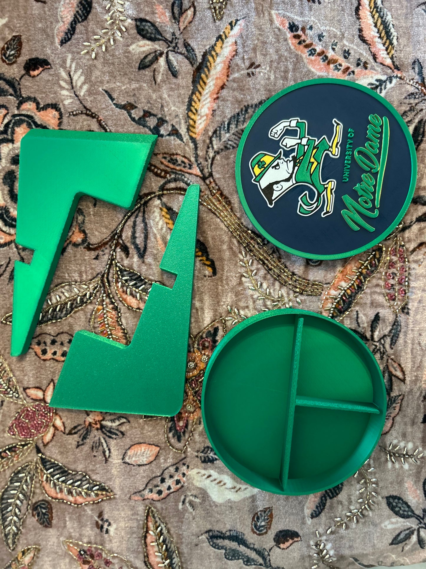 Notre Dame Fighting Irish leprechaun 3D printed round storage box with blue base and wedge display stand