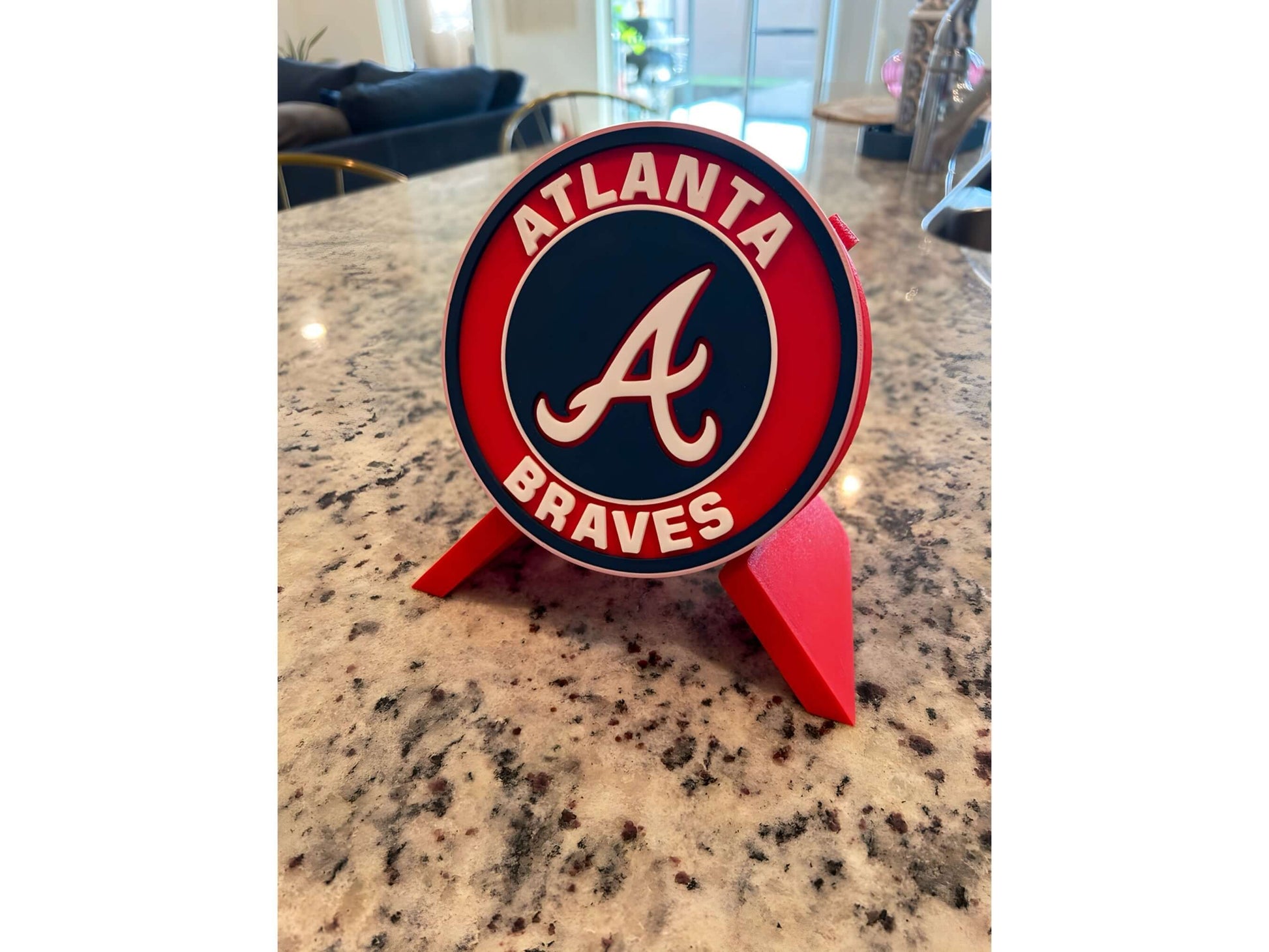 3D printed Atlanta Braves plaque on display, showcasing vibrant colors and unique sports decor for baseball fans.