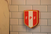3D printed Peruvian Football Federation plaque, vibrant colors, unique piece for soccer fans, no assembly required.