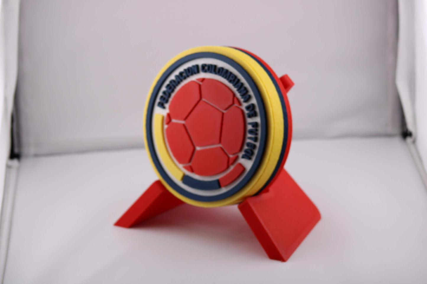 Colombia 3D Printed Soccer Emblem on display, vibrant colors, no assembly required, perfect gift for Cafeteros fans.