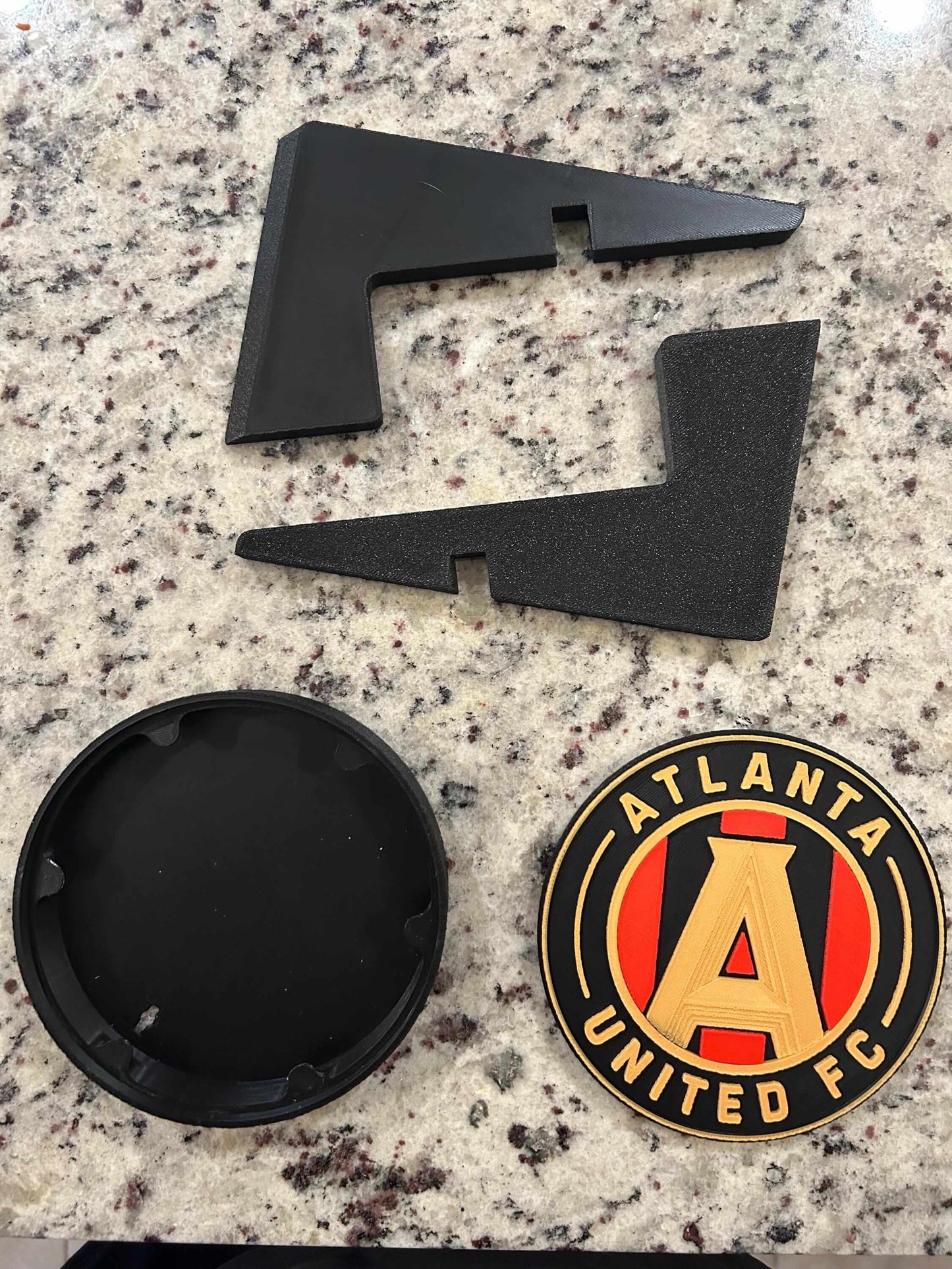 Atlanta United FC 3D printed plaque components, including support pieces and custom soccer shield base.
