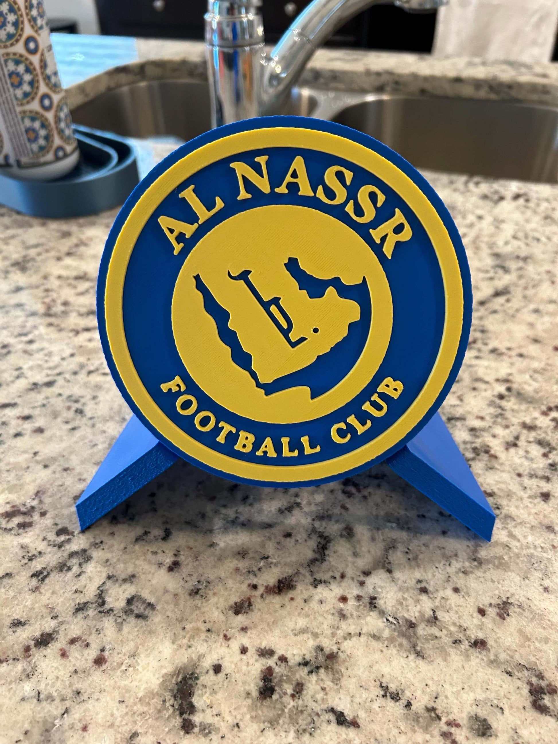 Al Nassr FC 3D printed plaque in blue and yellow, showcasing the team's logo, perfect for passionate soccer fans.