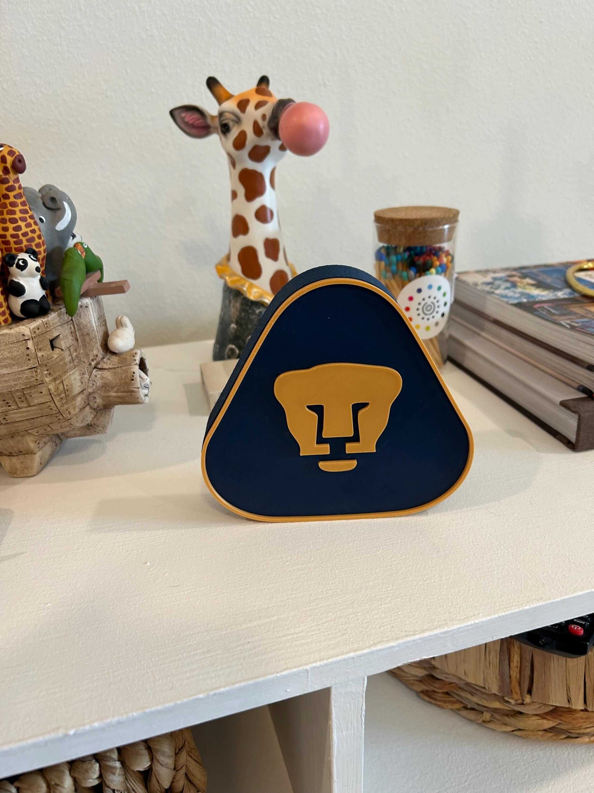 3D printed Pumas UNAM plaque in vibrant colors, showcasing iconic soccer shield for passionate fans.