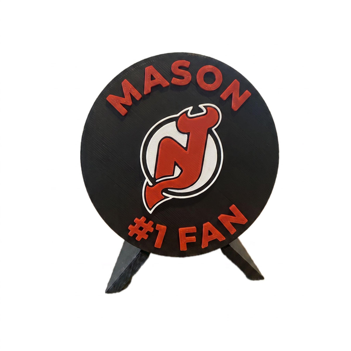 Personalized New Jersey Devils medallion example with the name MASON on top and #1 FAN on the bottom, 3D printed to order