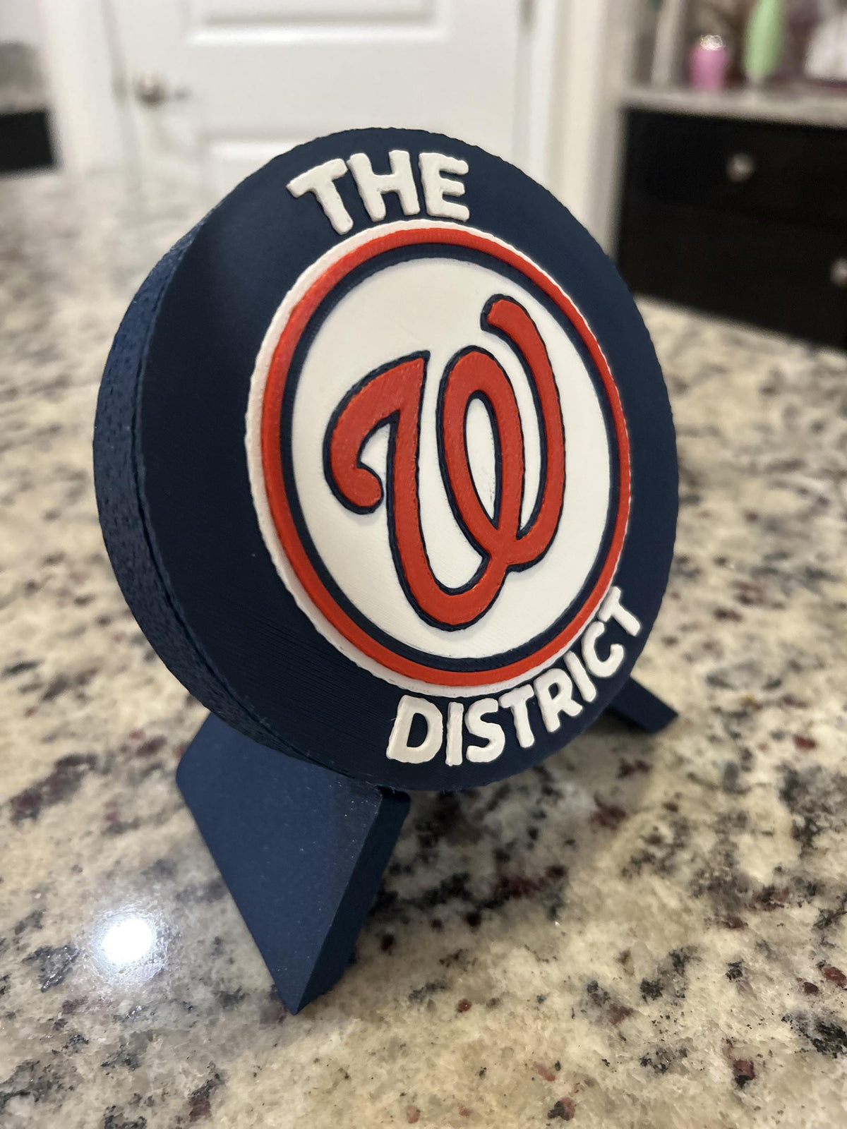 Washington Nationals red variation on stand