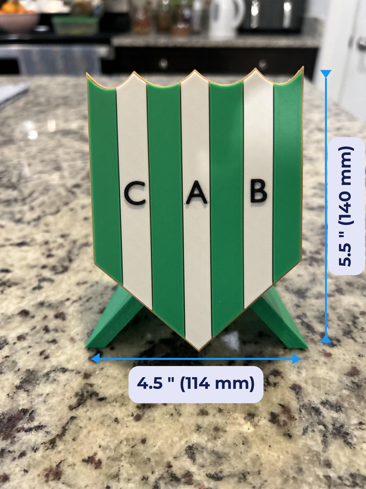 Size guide: Banfield 3D printed escudo crest, about 5.5 inches (140 mm) tall and 4.5 inches (114 mm) wide
