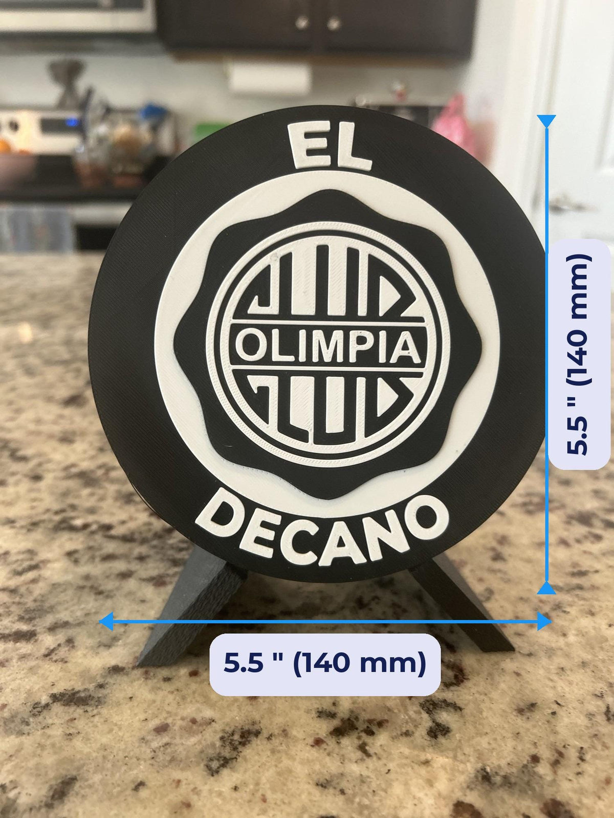 Size guide: Club Olimpia 3D printed round medallion 5.5 inches (140 mm) across, about 1 inch (25 mm) deep on the stand