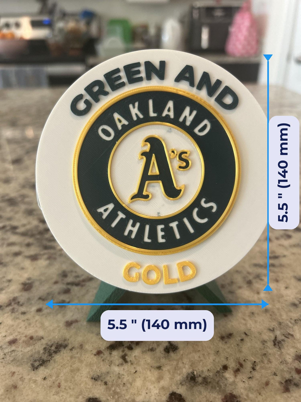 Size guide: Oakland Athletics 3D printed round medallion 5.5 inches (140 mm) across, about 1 inch (25 mm) deep on the stand