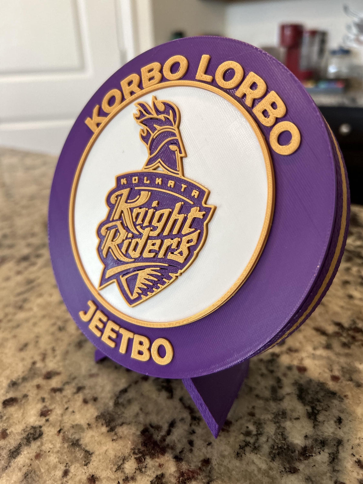 Kolkata Knight Riders KKR 3D printed purple and gold roundel display with leg stand and hidden stash box, personalized IPL cricket fan gift, made in USA