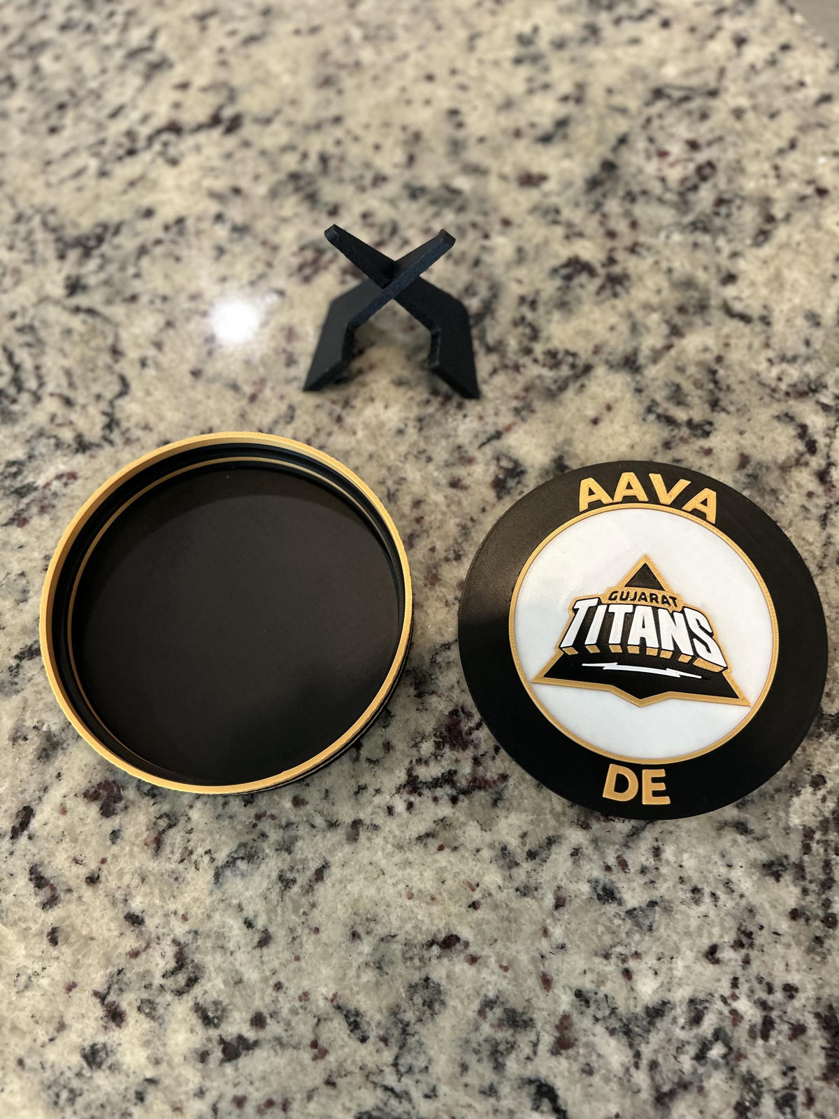 Gujarat Titans GT 3D printed black and gold roundel display with leg stand and hidden stash box, personalized IPL cricket fan gift, made in USA