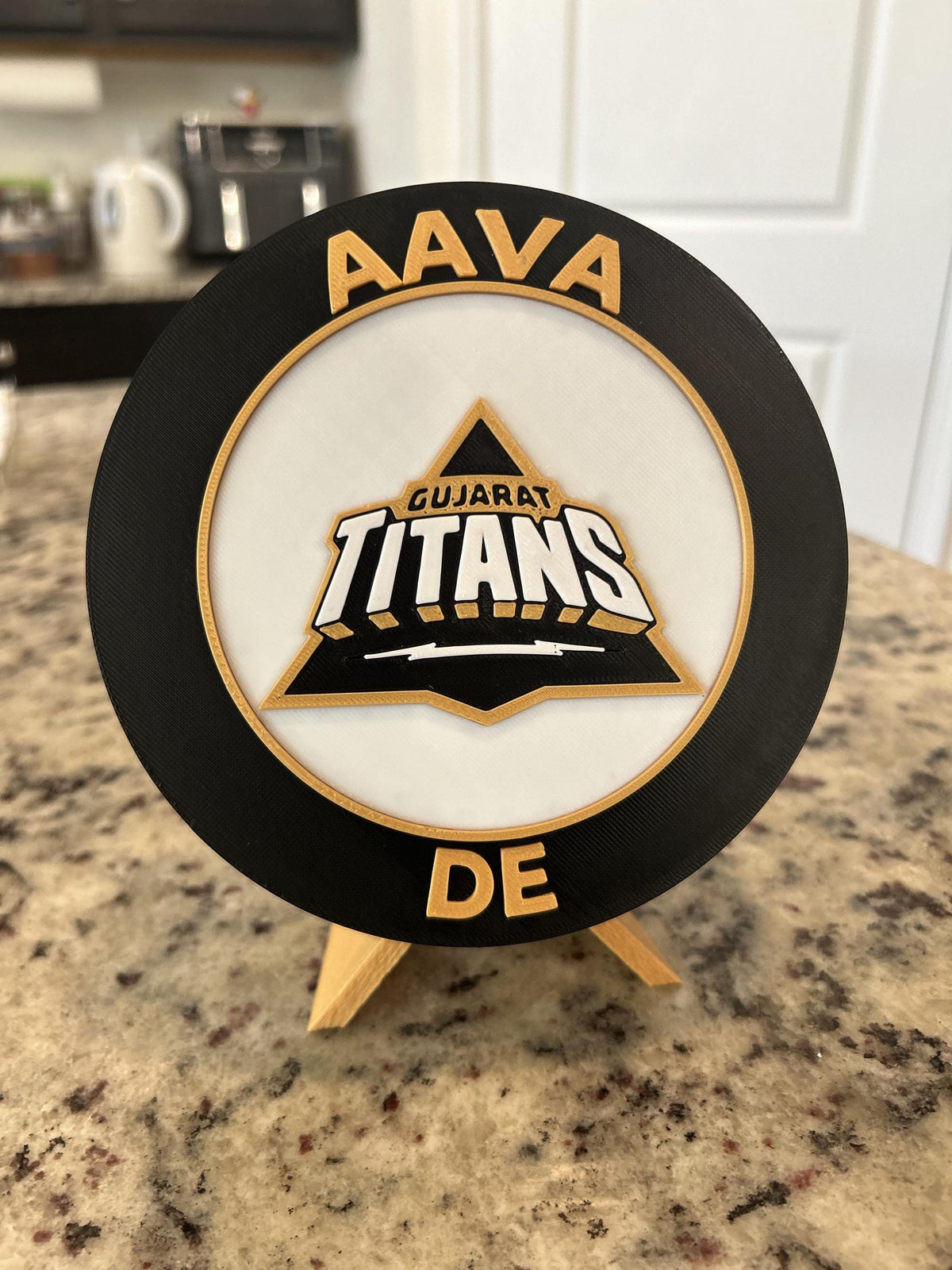 Gujarat Titans GT 3D printed black and gold roundel display with leg stand and hidden stash box, personalized IPL cricket fan gift, made in USA
