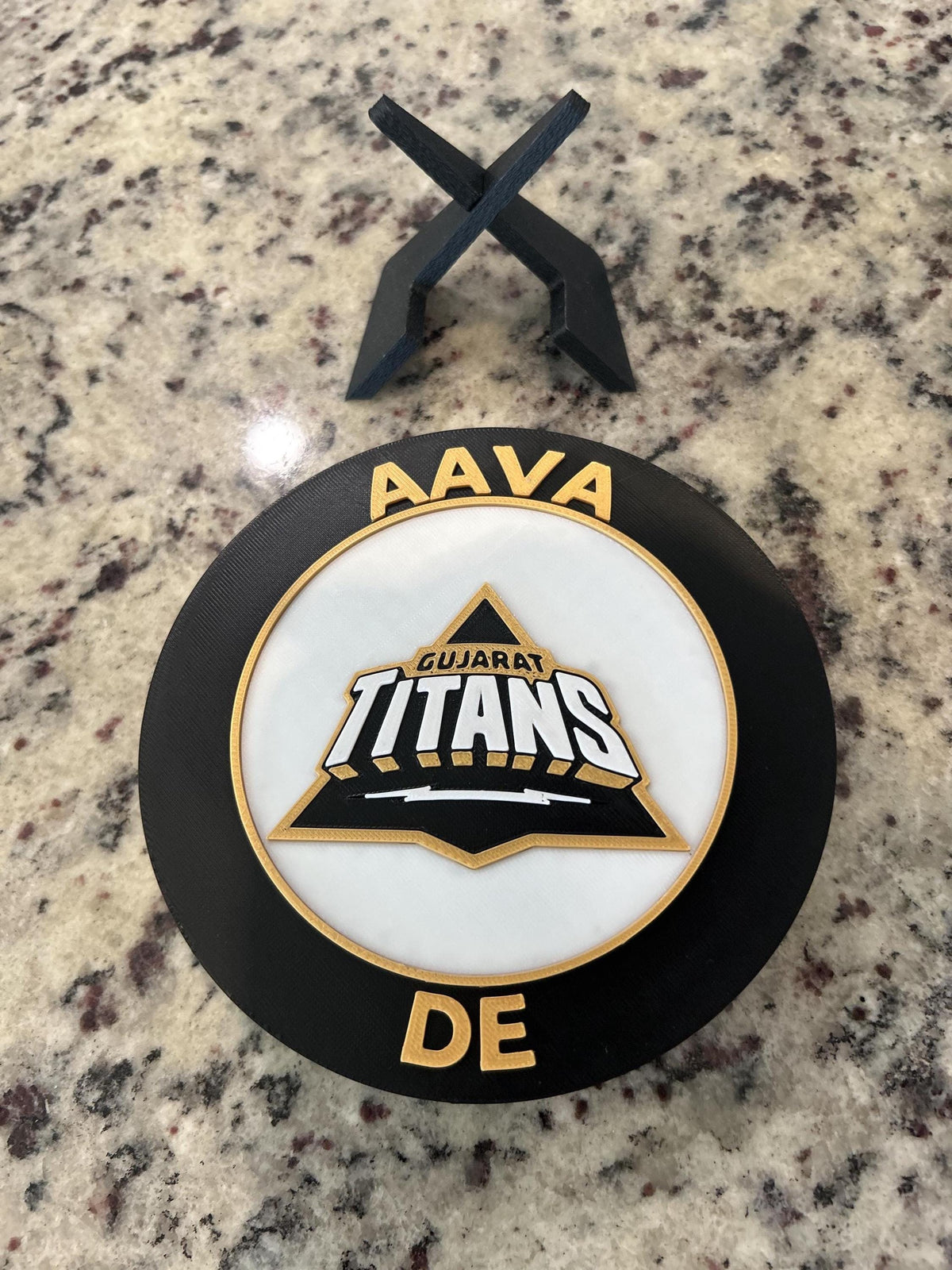 Gujarat Titans GT 3D printed black and gold roundel display with leg stand and hidden stash box, personalized IPL cricket fan gift, made in USA