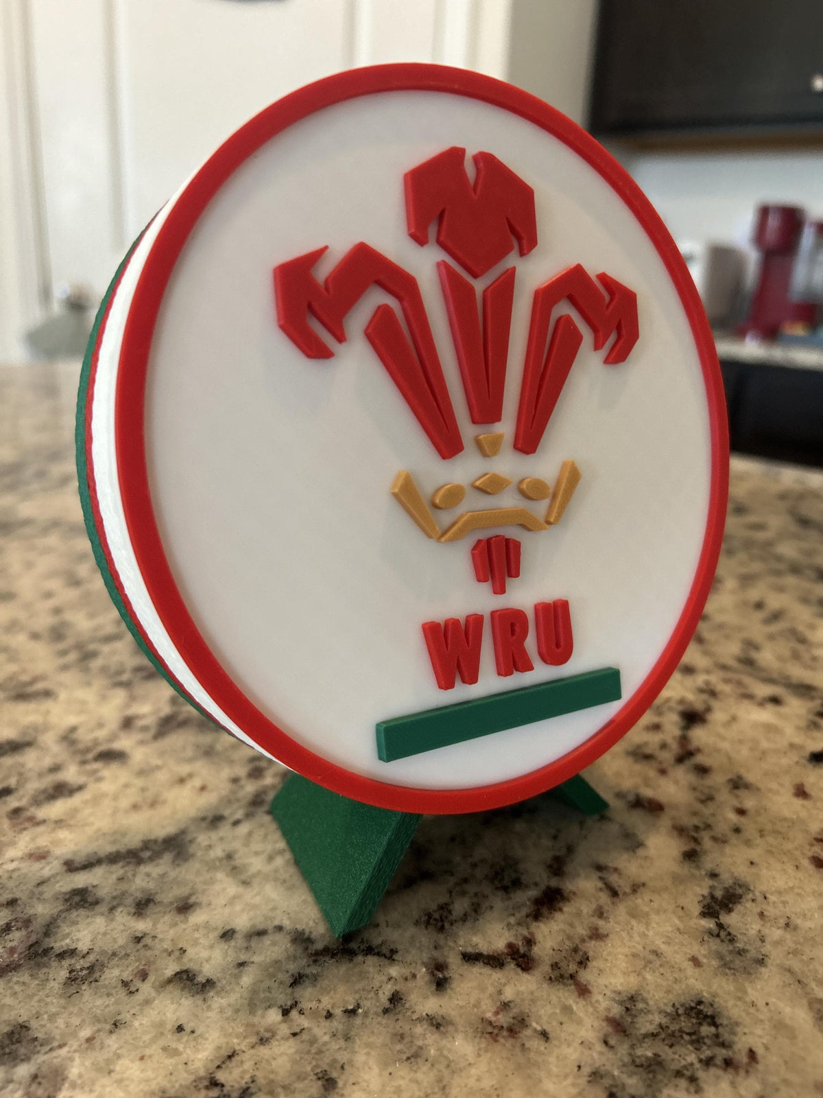 Wales rugby WRU 3D printed feathers crest roundel with Welsh tricolor base and green stand and hidden stash box, personalized Cymru am Byth rugby fan gift, made in USA