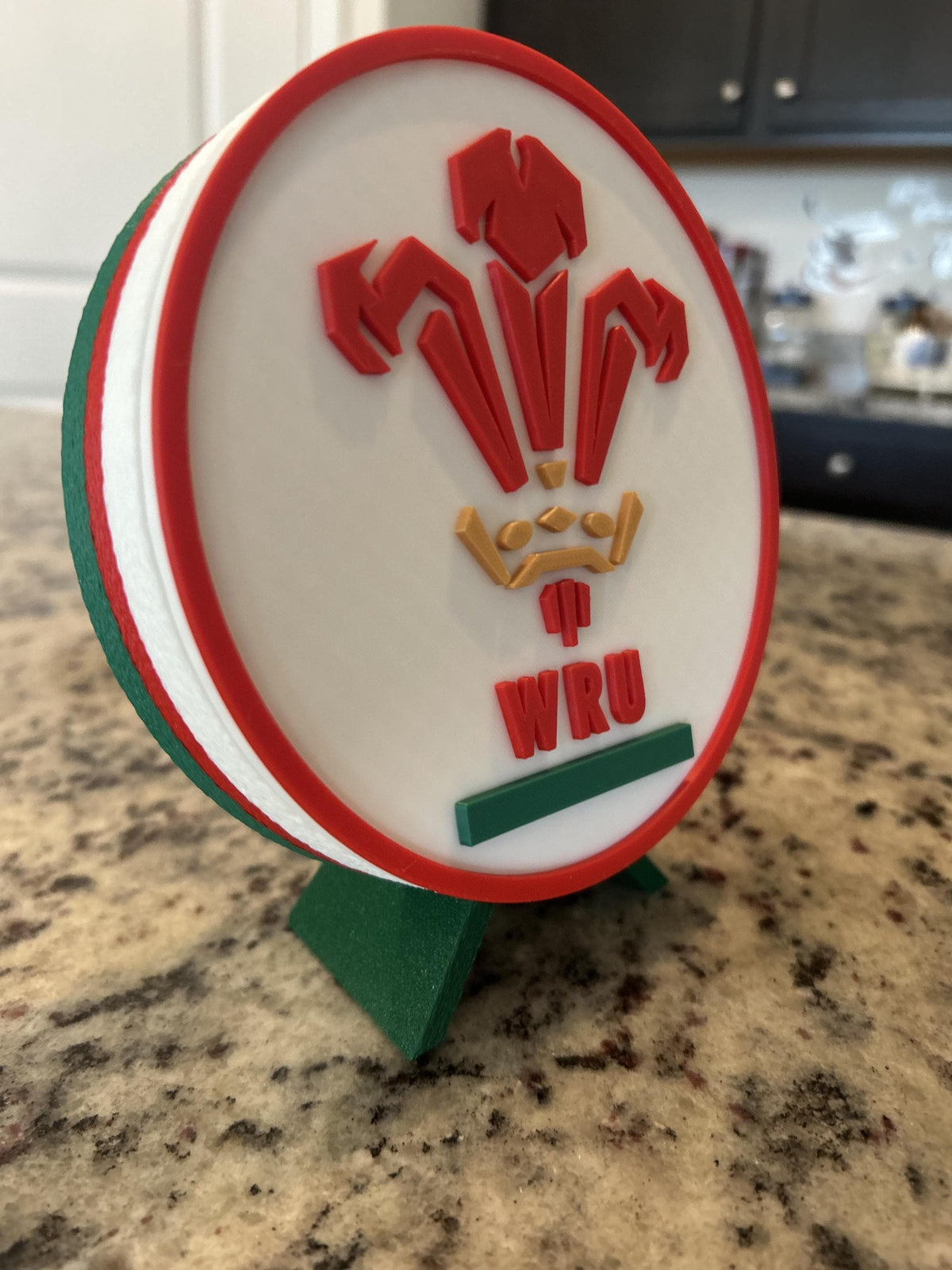 Wales rugby WRU 3D printed feathers crest roundel with Welsh tricolor base and green stand and hidden stash box, personalized Cymru am Byth rugby fan gift, made in USA