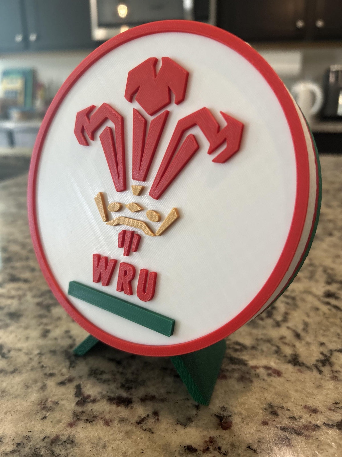 Wales rugby WRU 3D printed feathers crest roundel with Welsh tricolor base and green stand and hidden stash box, personalized Cymru am Byth rugby fan gift, made in USA