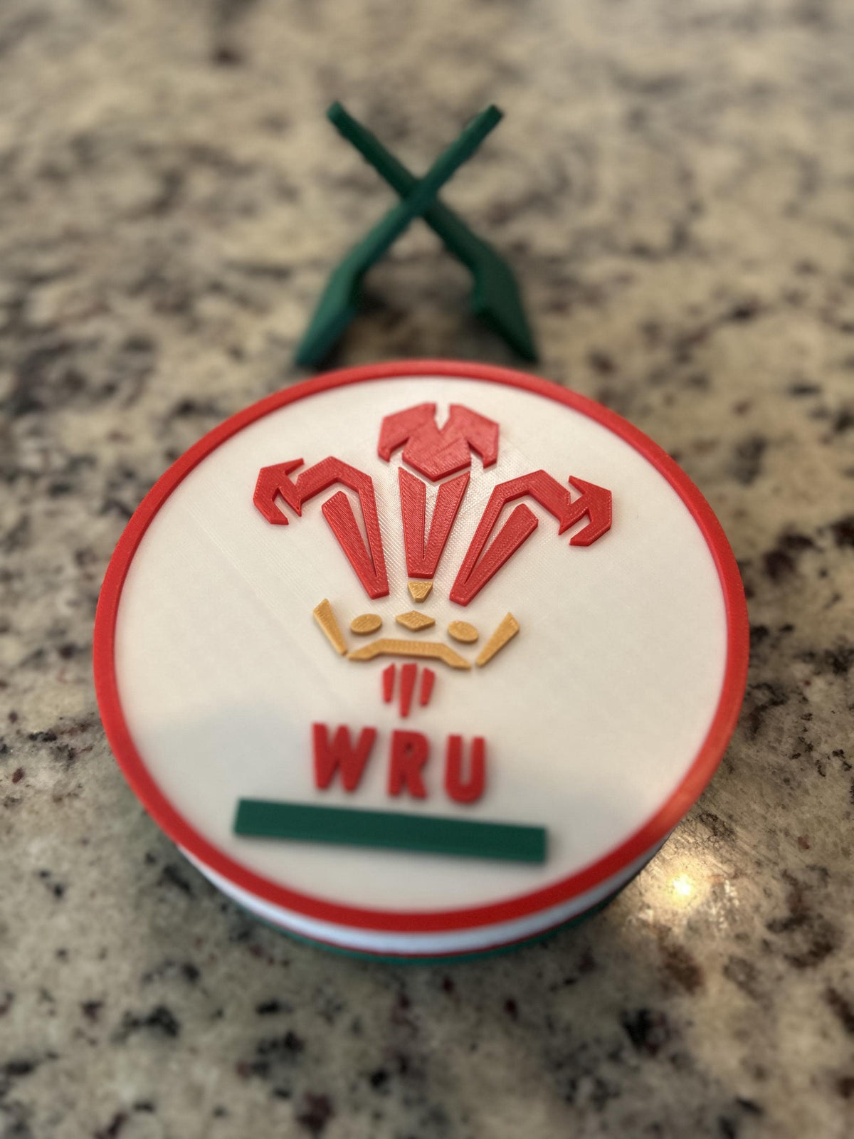 Wales rugby WRU 3D printed feathers crest roundel with Welsh tricolor base and green stand and hidden stash box, personalized Cymru am Byth rugby fan gift, made in USA