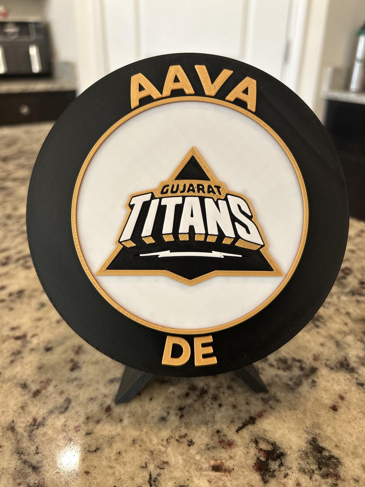 Gujarat Titans GT 3D printed black and gold roundel display with leg stand and hidden stash box, personalized IPL cricket fan gift, made in USA