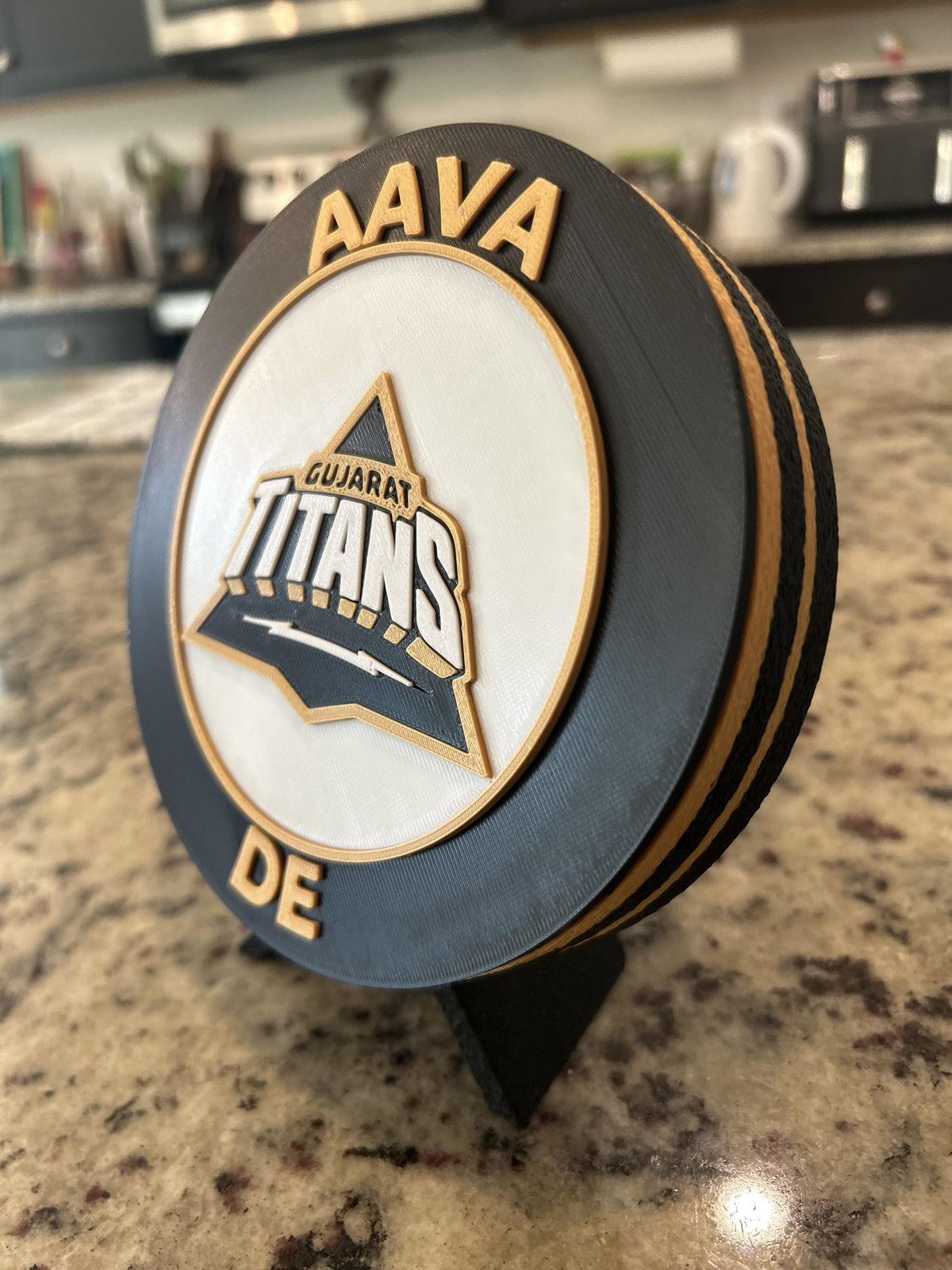 Gujarat Titans GT 3D printed black and gold roundel display with leg stand and hidden stash box, personalized IPL cricket fan gift, made in USA