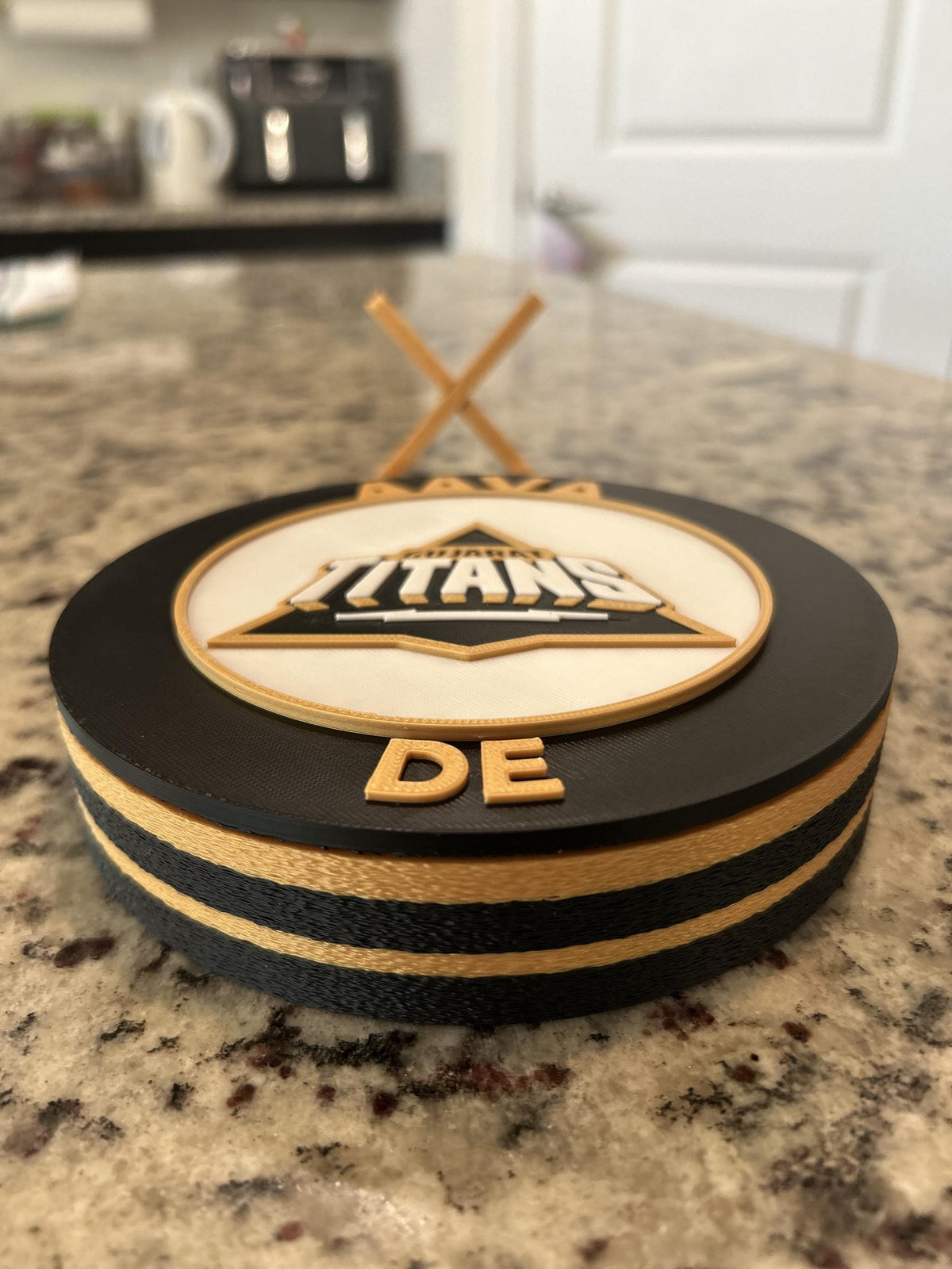 Gujarat Titans GT 3D printed black and gold roundel display with leg stand and hidden stash box, personalized IPL cricket fan gift, made in USA