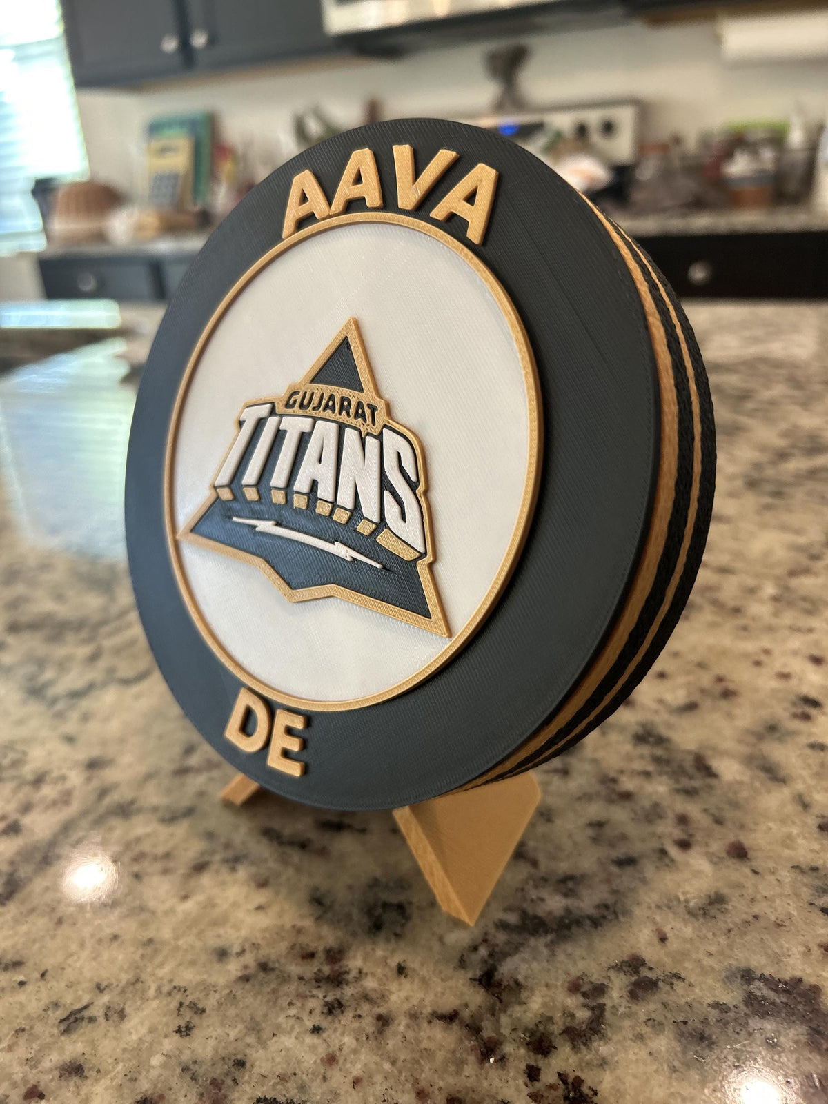 Gujarat Titans GT 3D printed black and gold roundel display with leg stand and hidden stash box, personalized IPL cricket fan gift, made in USA