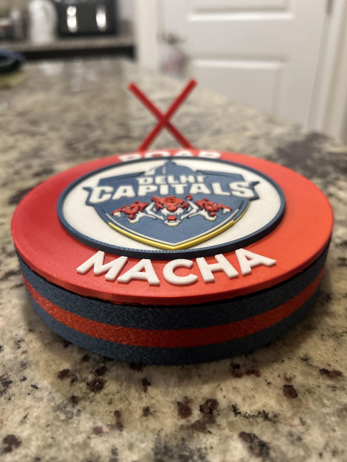 Delhi Capitals 3D printed red roundel display with stand and hidden stash box, personalized Roar Macha IPL cricket fan gift, made in USA