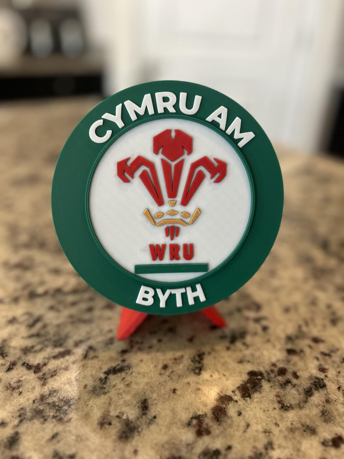 Wales rugby WRU 3D printed feathers crest roundel with Welsh tricolor base and green stand and hidden stash box, personalized Cymru am Byth rugby fan gift, made in USA