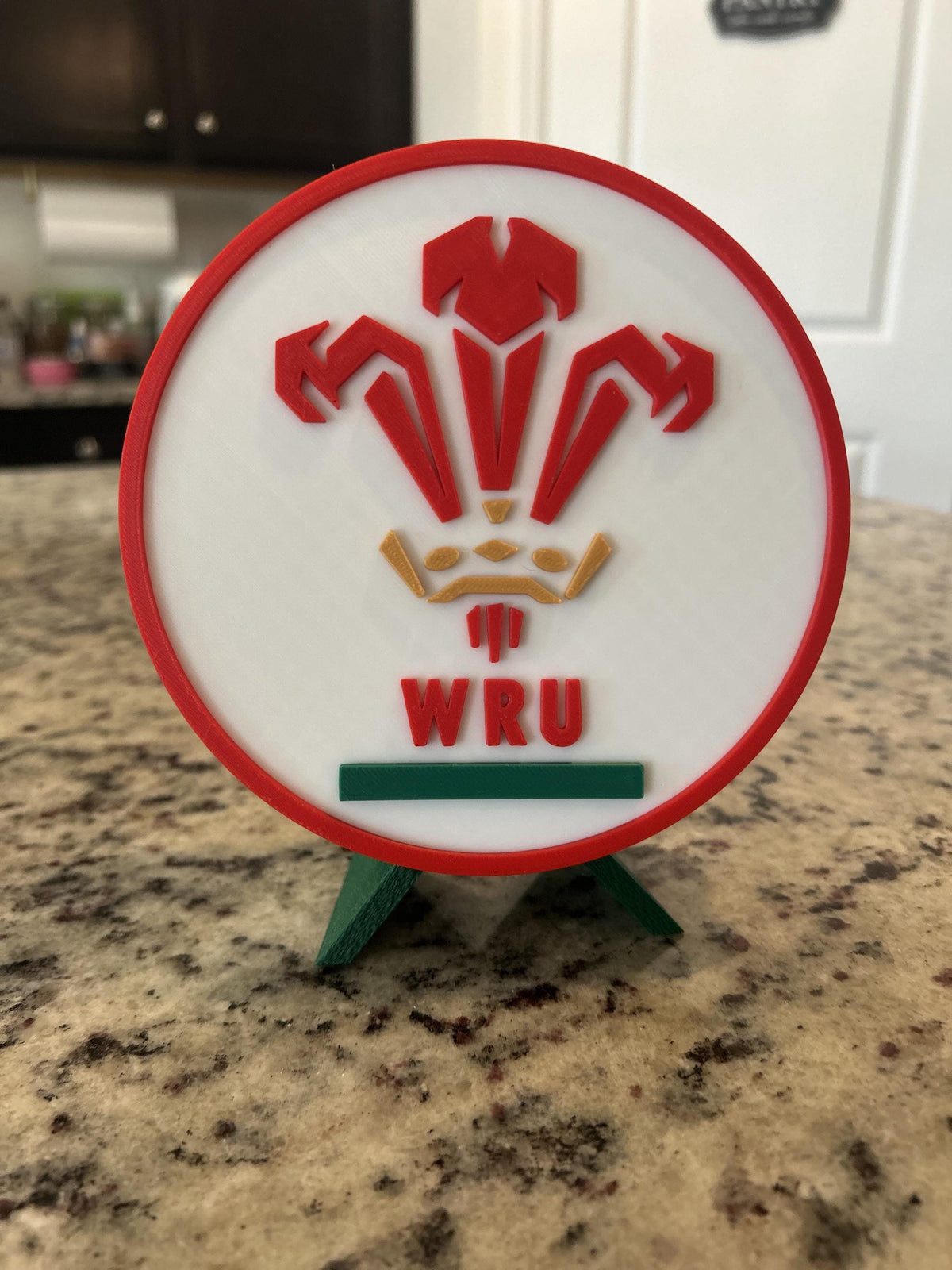 Wales rugby WRU 3D printed feathers crest roundel with Welsh tricolor base and green stand and hidden stash box, personalized Cymru am Byth rugby fan gift, made in USA