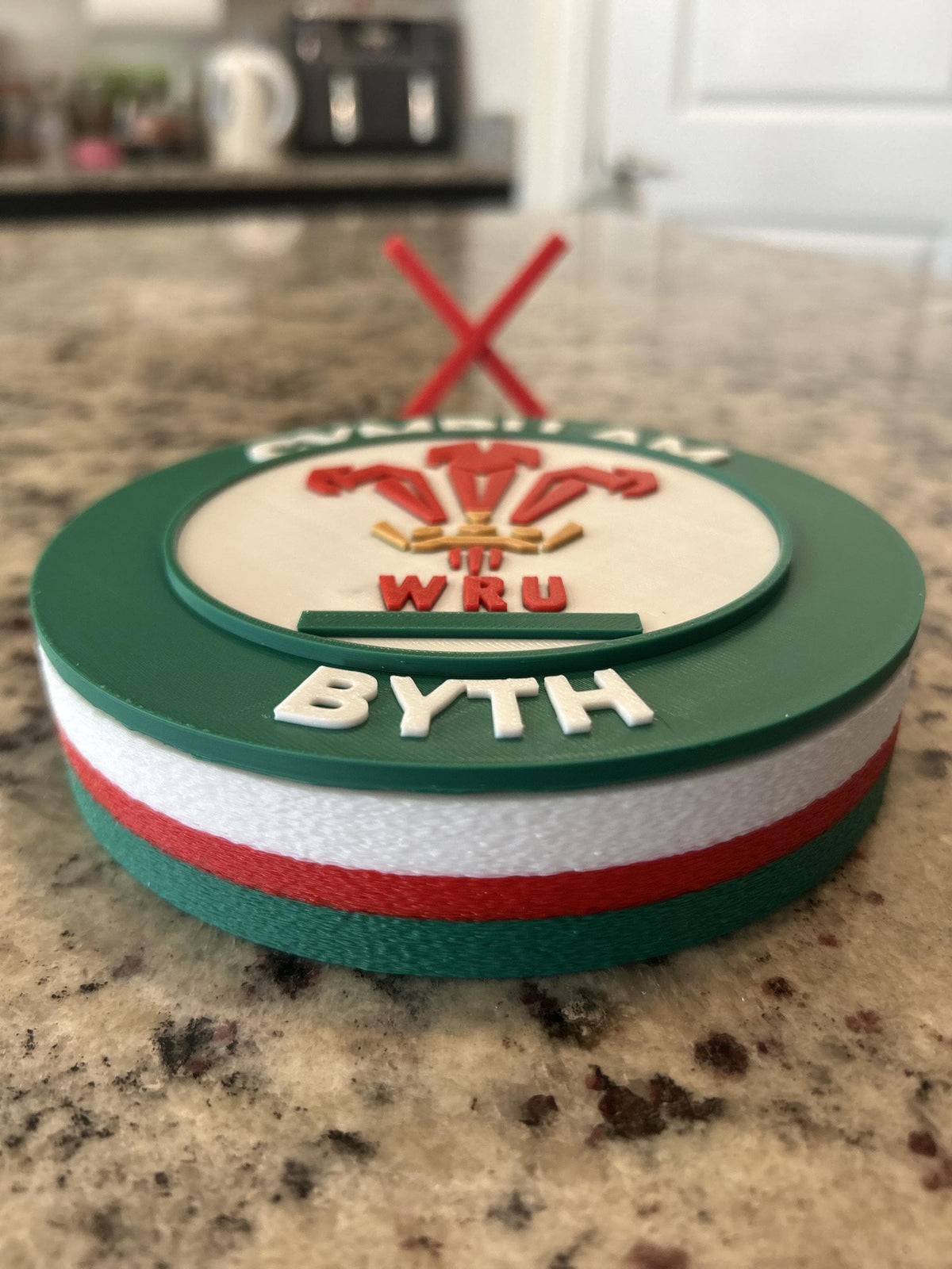 Wales rugby WRU 3D printed feathers crest roundel with Welsh tricolor base and green stand and hidden stash box, personalized Cymru am Byth rugby fan gift, made in USA