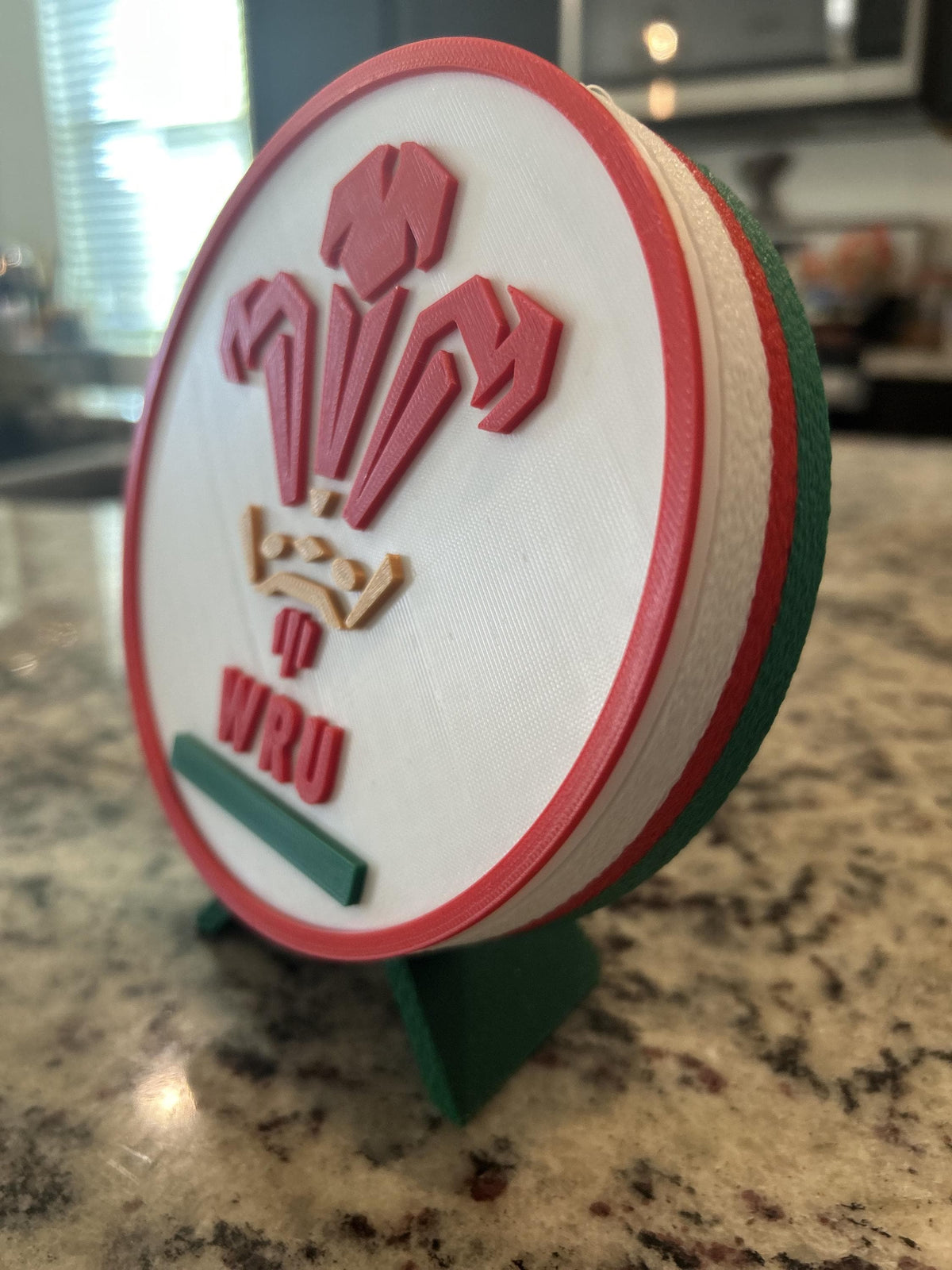 Wales rugby WRU 3D printed feathers crest roundel with Welsh tricolor base and green stand and hidden stash box, personalized Cymru am Byth rugby fan gift, made in USA