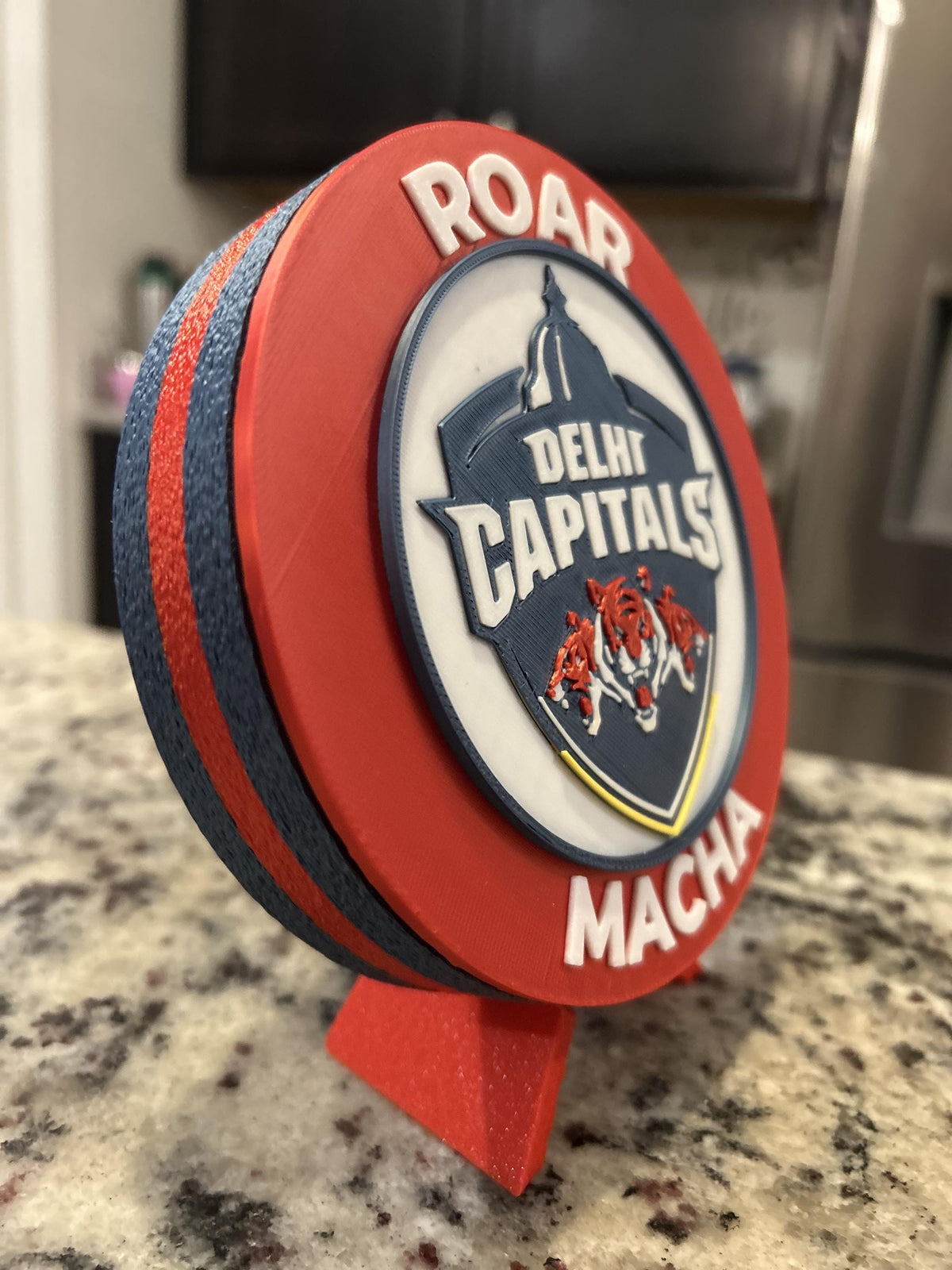 Delhi Capitals 3D printed red roundel display with stand and hidden stash box, personalized Roar Macha IPL cricket fan gift, made in USA